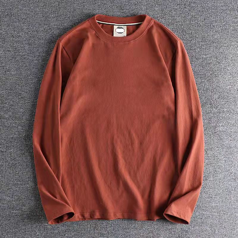 Brown sweatshirt on a gray textured background
